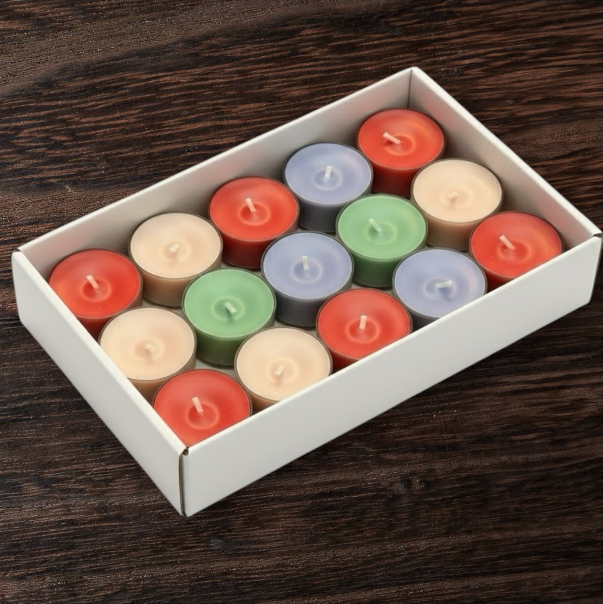 Get the Pastel Harmony Scented Tea Light Candle Gift Set. A bulk pack of 36 beautifully colored tea lights in a decorative gold foil gift box. Perfect for ambiance & gifting.