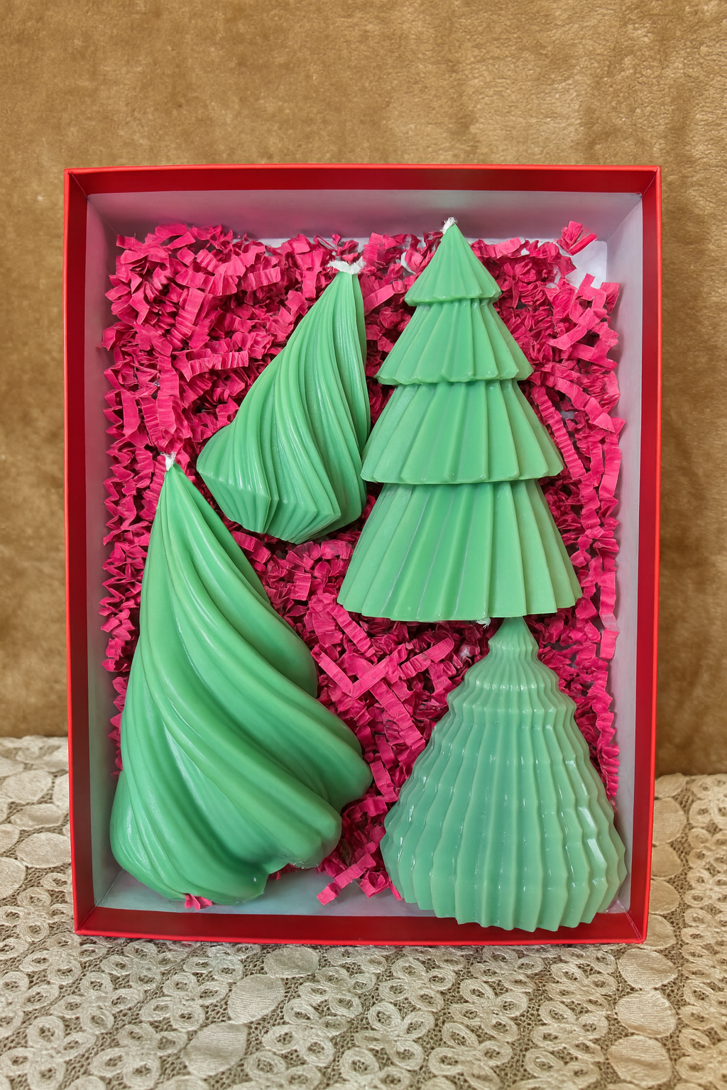 A beautifully sculpted set of green Christmas tree candles perfect for festive décor, gifting, and holiday ambience.